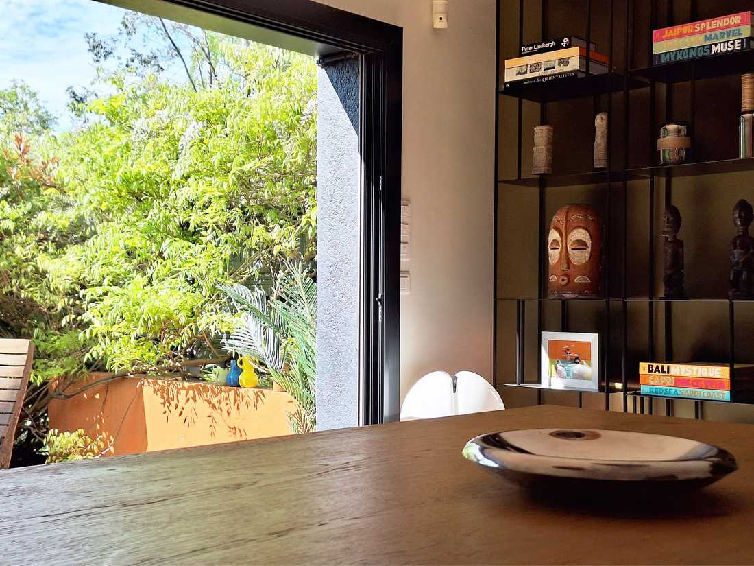 Table avec deux suspensions Chouchin 3 orange de Foscarini