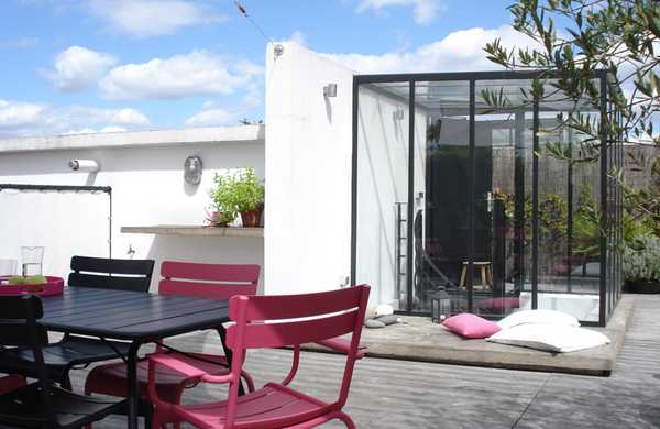 Transformation d'un toit en terrasse végétalisée style Loft par un architece paysagiste à Nantes