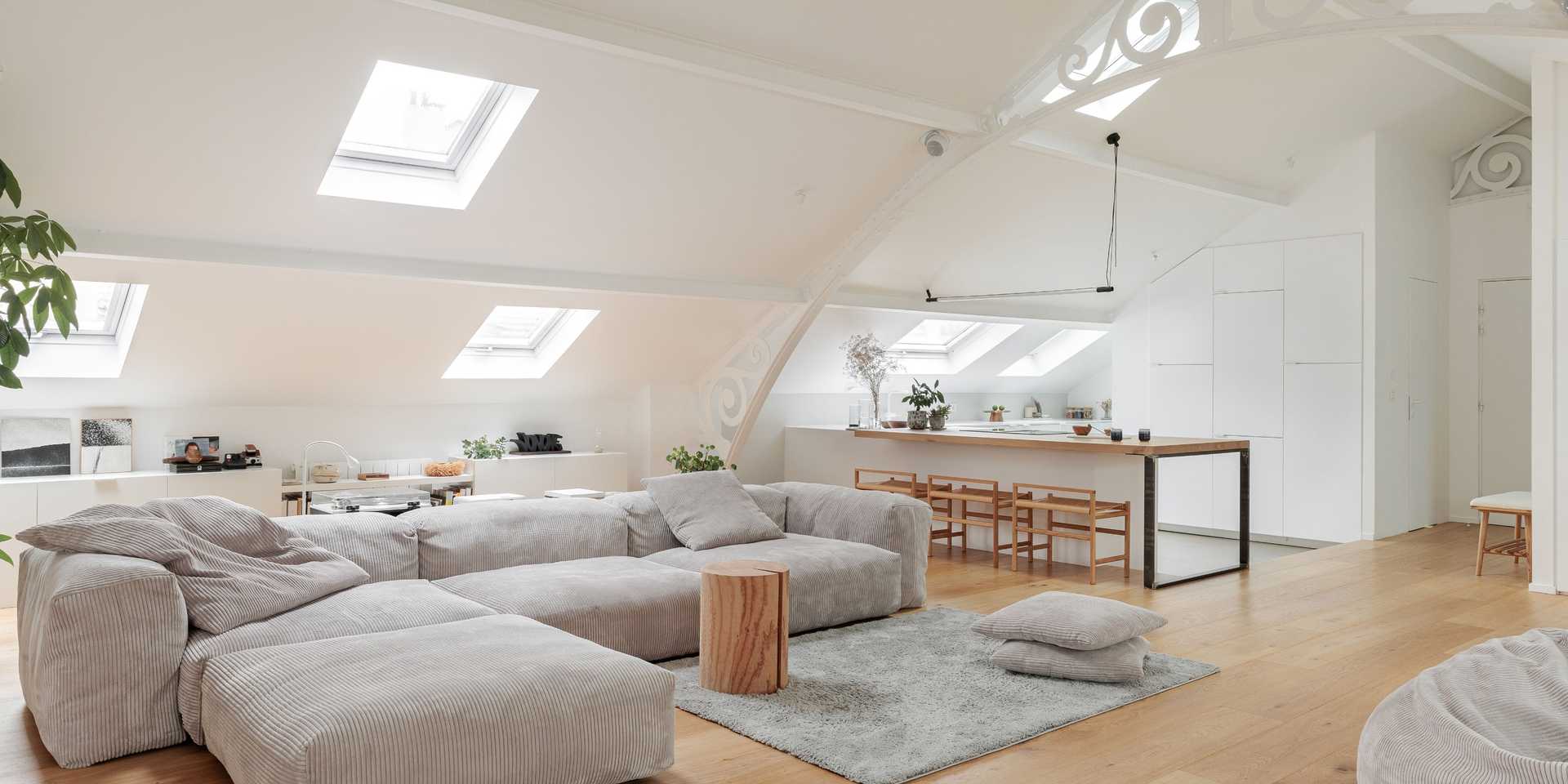 Living room with open kitchen designed by an interior designer in Nantes